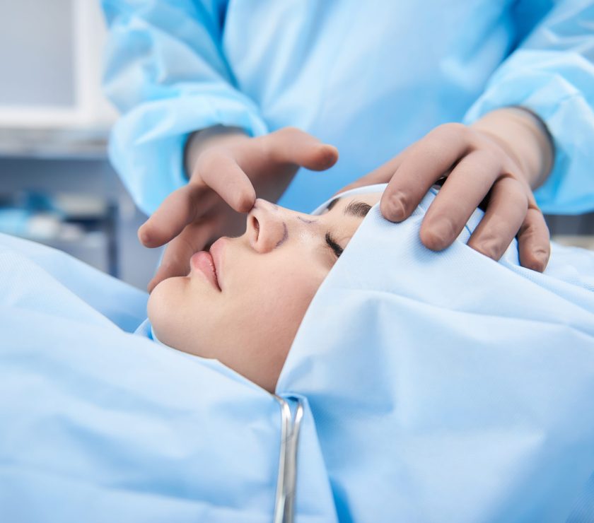 Doctor,Making,Rhinoplasty,To,Lady.,Surgeon,Palpating,Female,Patient,Nose