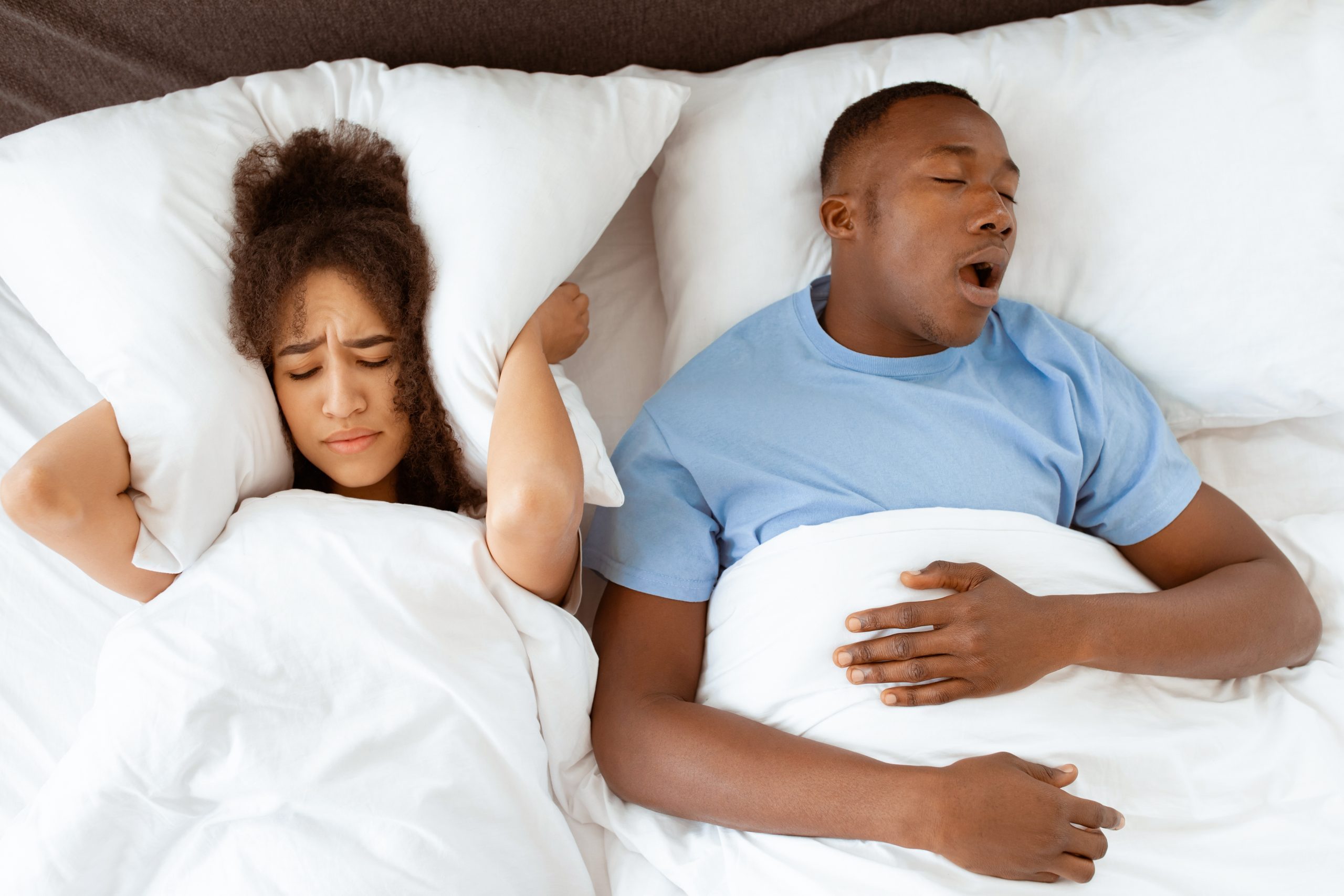 Family,Problems,,Apnea,And,Insomnia,Due,Spouse.,Young,Tired,African