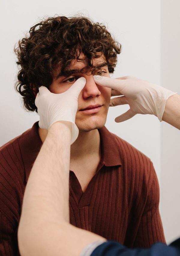 Ent,Doctor,Examine,Nose,Of,Male,Patient,Before,Rhinoplasty,Surgery.