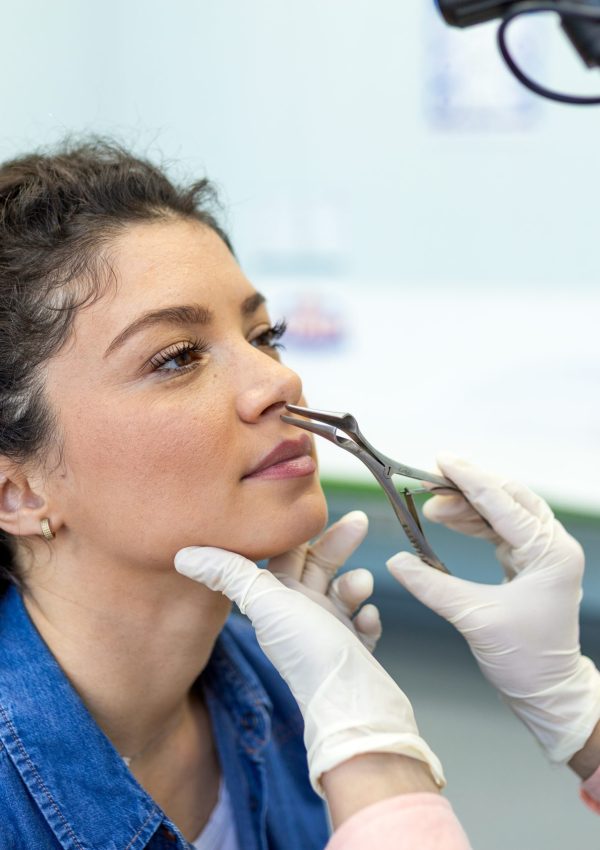 Ent,Doctor,Specialist,Performing,Nasal,Examination,On,Patient.,Professional,Otolaryngologist