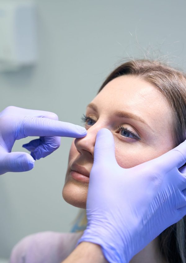 Ent,Doctor,Examines,Nose,Of,Female,Patient,Before,Rhinoplasty,Surgery